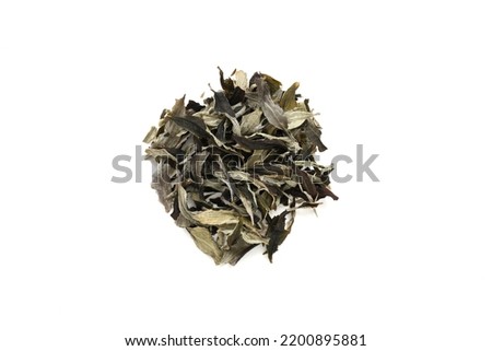 Organic White Tea on white background. whole leaf. Top view. Close up. High resolution stock photos. 
