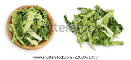 chopped savoy cabbage in wooden bowl isolated on white background with full depth of field. Top view. Flat lay Royalty-Free Stock Photo #2200961039
