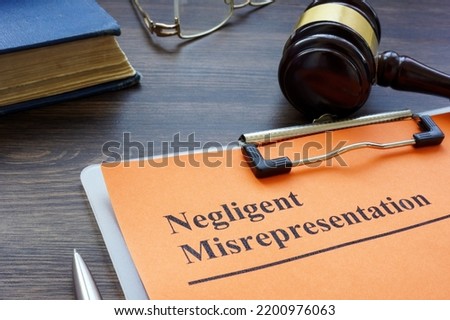 Document about Negligent misrepresentation and a gavel. Royalty-Free Stock Photo #2200976063