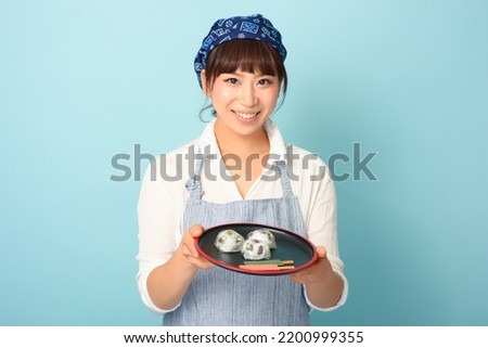 Middle Japanese female Clerk Waitress image
