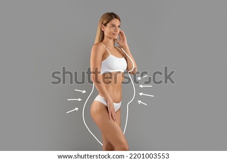 Slimming Concept. Beautiful Sporty Female In Underwear With Drawn Outlines And Arrows Around Body Standing Isolated Over Grey Studio Background, Young Woman Enjoying Result Of Weight Loss, Collage
