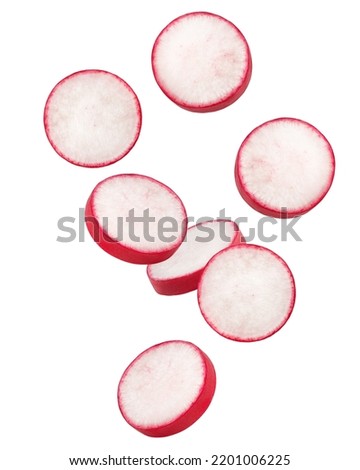 Falling Radish slice isolated on white background, clipping path, full depth of field Royalty-Free Stock Photo #2201006225