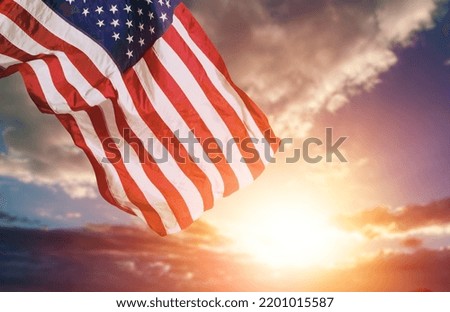 American flag waving in the sunrise. American flag for Memorial Day,4th of July,Labour Day.Independence Day concept.