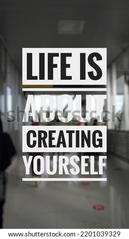 Inspirational quotes "Life is about creating yourself" in urban background