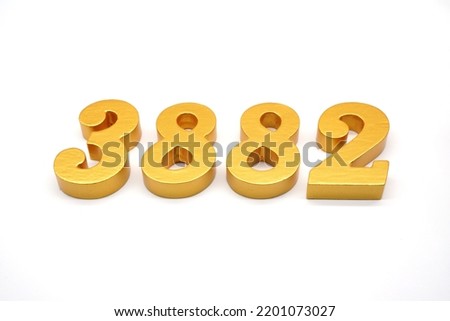   Number 3882 is made of gold-painted teak, 1 centimeter thick, placed on a white background to visualize it in 3D.                                   