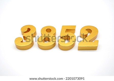   Number 3852 is made of gold-painted teak, 1 centimeter thick, placed on a white background to visualize it in 3D.                                   