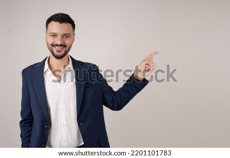 Arabian Business Man pointing with hand on white background