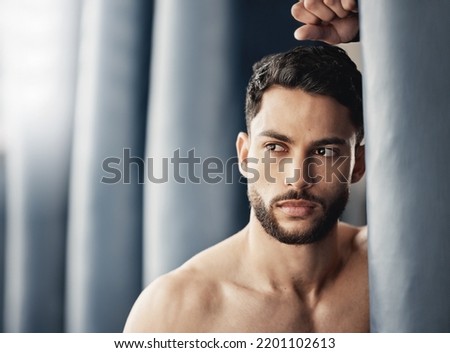 Skincare, cosmetics and grooming with handsome man looking confident after beauty treatment. Young male posing and thinking, enjoying self care and routine hygiene, proud and relax alone at home Royalty-Free Stock Photo #2201102613