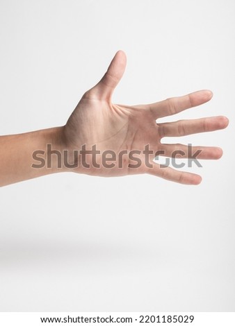 closeup of counting hand gesture isolated on white background