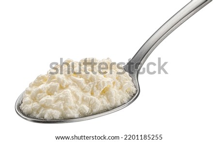 Homemade yogurt in spoon isolated on white background Royalty-Free Stock Photo #2201185255
