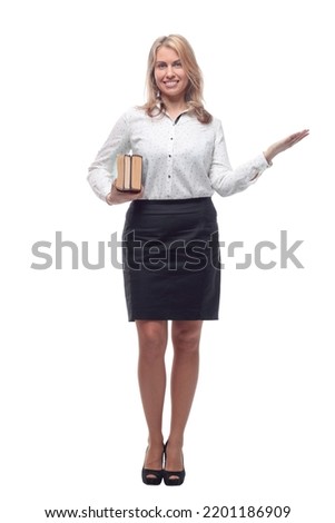 smiling business woman with a stack of books. isolated on a white background.