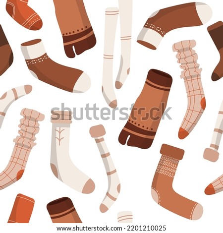 Seamless pattern with cotton and woolen socks with different textures isolated on white background. Bundle of trendy clothing items. Modern garment or apparel set. Flat cartoon vector illustration.