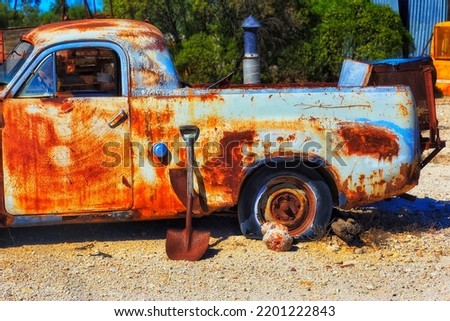 Old rust heritage ute truck vehicle in Lightning Ridge opal mine town of outback Australia. Royalty-Free Stock Photo #2201222843