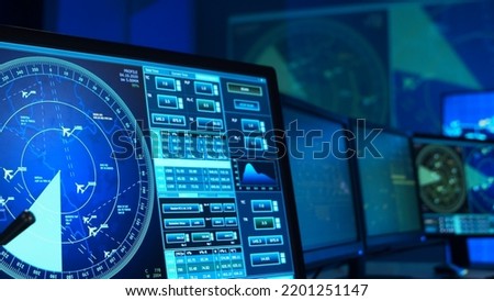 Workplace of the air traffic controllers in the control tower. Team of professional aircraft control officers works using radar, computer navigation and digital maps. Aviation concept. Royalty-Free Stock Photo #2201251147