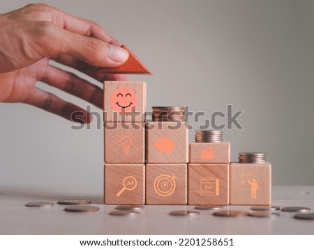 Insurance and stages of life saving money. cube with assurance icon standing on finance, education, real estate and property, child, family and pension planing icon .Insurance  dart board concept