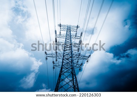High voltage towers with sky background. 