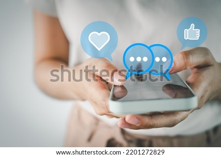 Smartphone for Social Media,Digital Online, social network,work from home,Social Distancing Concept.,Selective focus Female Hands using smartphone with social media icon for business,technology idea.