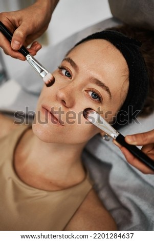 Face massage with brushes. High quality photo