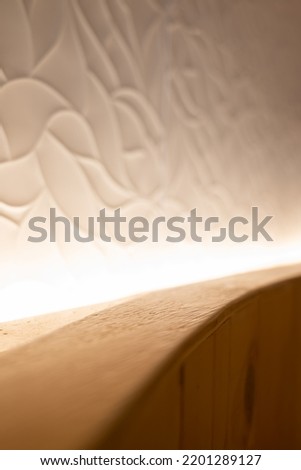 a background with wooden shelves and white walls