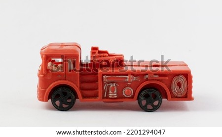 red used toy car isolated on white