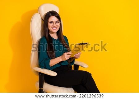 Profile side photo of young woman use tablet banker manager financier isolated over yellow color background