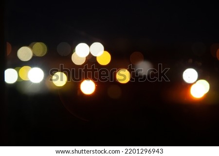 Colorful defocused bokeh lights background. Abstract blur background.