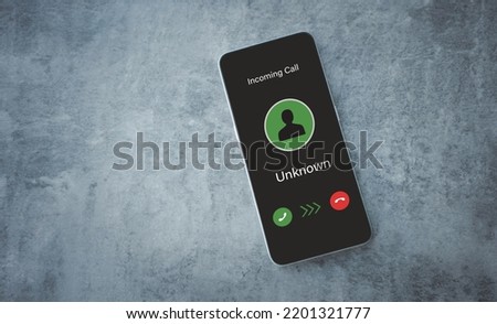 Unknown caller, Scammer or stranger.Scam on phone and online. Royalty-Free Stock Photo #2201321777