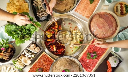 A table of delicious hot pot food Royalty-Free Stock Photo #2201369051