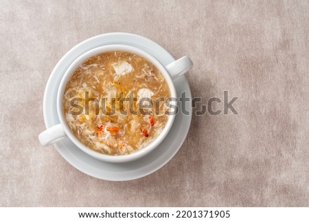 Shark fin soup (Indonesia : Soup Sirip Ikan Hiu) is a popular soup in Chinese cuisine which is usually served on special occasions such as weddings or banquets. Royalty-Free Stock Photo #2201371905
