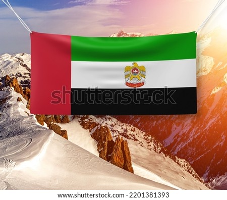 United Arab Emirates national flag cloth fabric waving on beautiful Background.