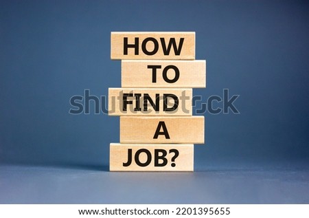 How to find a job symbol. Concept words How to find a job on wooden blocks on a beautiful grey table grey background. Business and how to find a job concept. Copy space.
