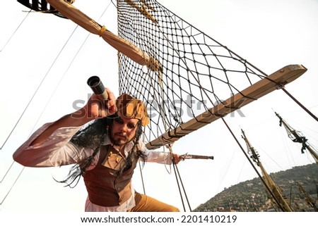 funny the pirate captain traveler  discoverer and explorer on the vintage pirate ship  on white background