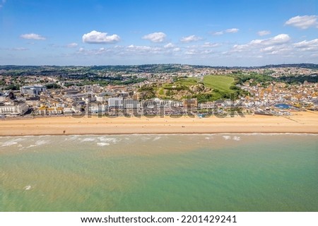 The drone aerial view of the town of Hastings, East Sussex ,England. Hastings is a large seaside town and borough in East Sussex on the south coast of England. Royalty-Free Stock Photo #2201429241