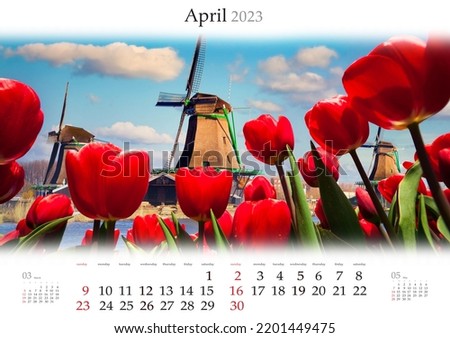 Wall calendar for 2023 year. April, B3 size. Set of calendars with amazing landscapes. Famous Dutch windmills. Splendid view through red tulips on Netherlands canals. Monthly calendar ready for print.