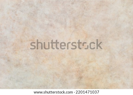 Pale orange smooth abstract background; light and airy food photography backgdrop; warm hue marble surface