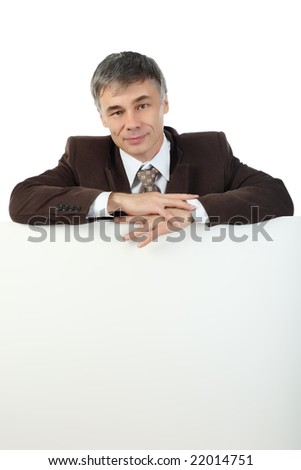 Business background: handsome businessman with white display