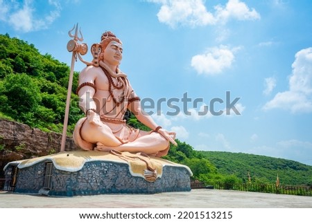 Hindu god Shiva sculpture sitting in meditation. Yoga and meditation concept. Royalty-Free Stock Photo #2201513215