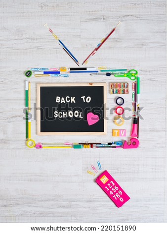 Funny colorful vintage television composed by colorful stationery objects, back to school concept.