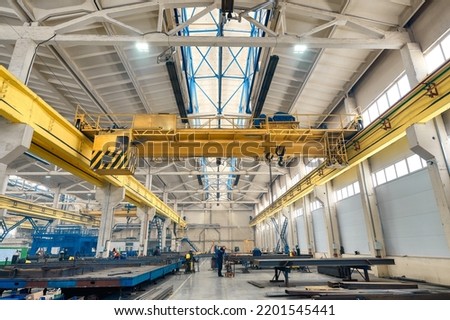 Department of long steel frames assembling in plant shop Royalty-Free Stock Photo #2201545441