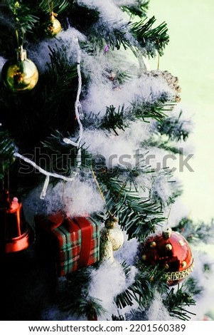 Christmas tree ornaments defocused lights background, stock photo