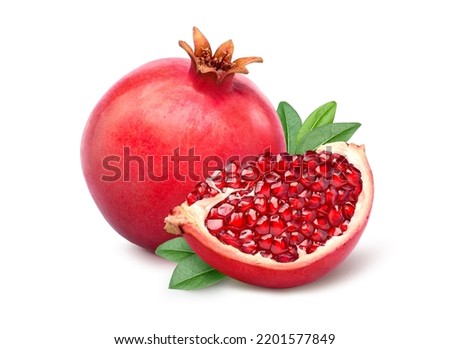 Pomegranate with cut in half isolated on white background. Clipping path. Royalty-Free Stock Photo #2201577849