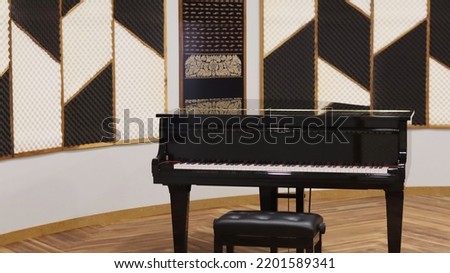 Interior of a hall room with a stylish classical grand piano