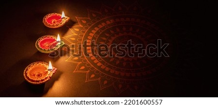 Diwali, Deepavali Hindu Festival of lights celebration. Diya oil lamp lit, copy space. Indian holiday greeting card template
 Royalty-Free Stock Photo #2201600557