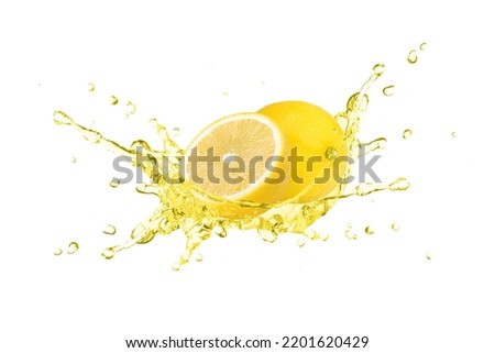 Lemon oil or lemon juice splash with fresh limon fruit isolated on white background.  Royalty-Free Stock Photo #2201620429