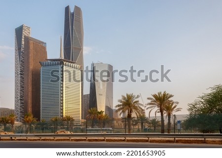 Riyadh roads and streets are filled with ornamental trees on both sides of the road, downtown, Riyadh skyline, King Abdullah Financial District, Saudi Arabia Royalty-Free Stock Photo #2201653905