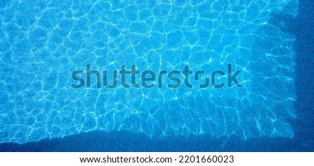 Overhead Drone Shot Of Clear Blue Water In Swimming Pool Royalty-Free Stock Photo #2201660023