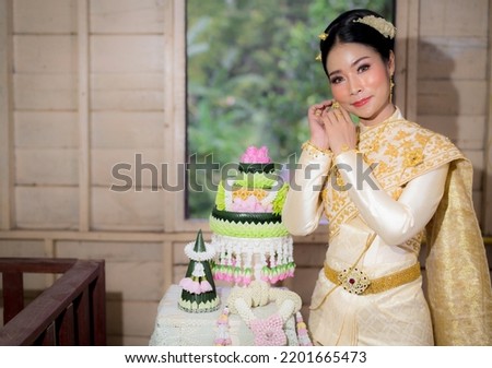 A beautiful Asian model in Thai traditional dress 