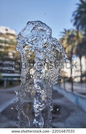Details of the jet of water from a fountain.