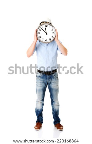 Businessman wearing helmet with clock .