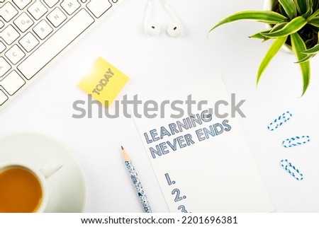 Text caption presenting Learning Never Ends. Internet Concept Life Long Educational and Wellness Opportunities Royalty-Free Stock Photo #2201696381